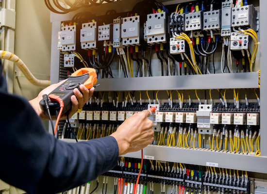 Electrician engineer work  tester measuring  voltage and current of power electric line in electical cabinet control. (Electrician engineer work  tester measuring  voltage and current of power electric line in electical cabinet control., ASCII, 118 co